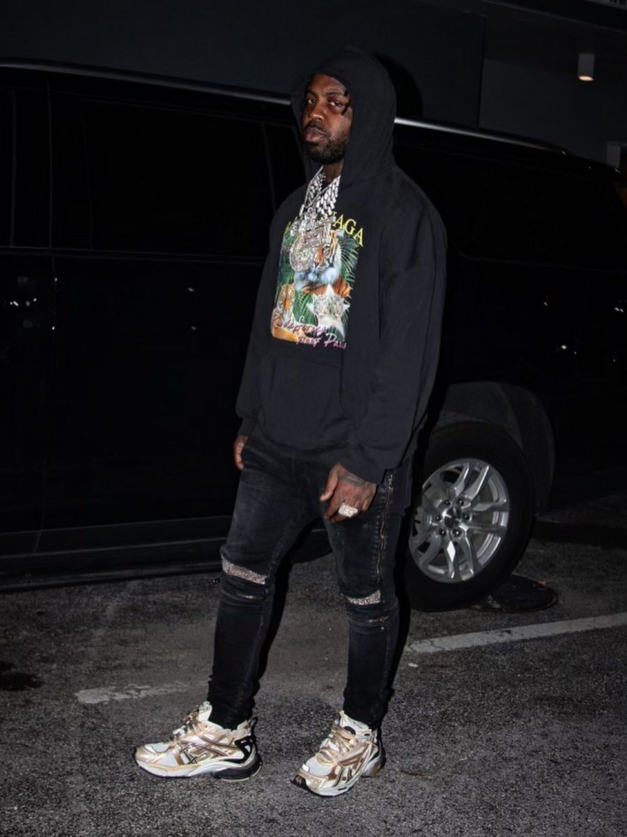 EST Gee Wearing a Balenciaga Tiger Hoodie & Valentines Sneakers With Amiri Jeans