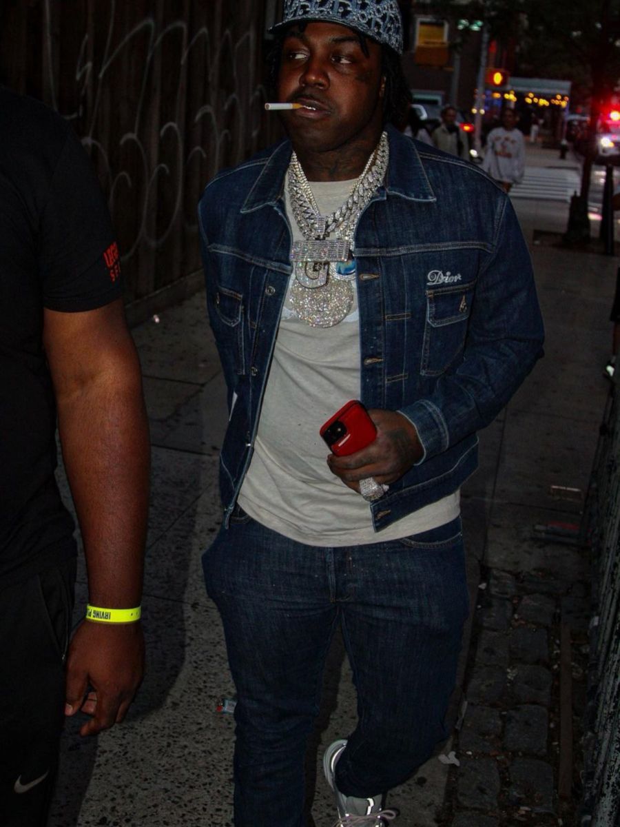 EST Gee Wearing a Dior Denim Jacket & Sneakers With a Dior x Peter Doig Tee