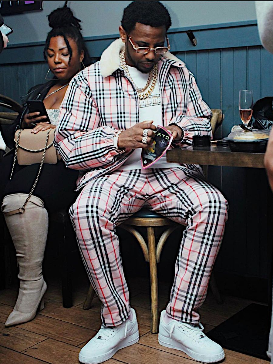 Fabolous Wearing a Burberry x Supreme Pink Check Jacket & Jeans With a Box Logo Tee