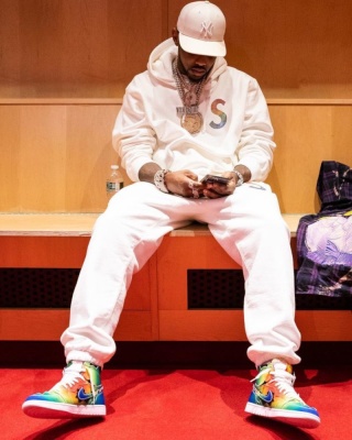 Fabolous Wearing A Supreme X Swarovski White Rainbow S Hoodie And Sweatpants With J Balvin Sneakers