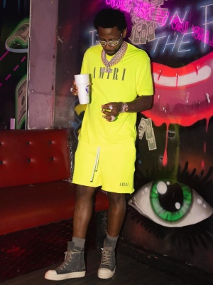 Fabolous Wearing An Amiri Yellow Core Logo Tee With Matching Sweatshorts And Rick Owens Sneakers