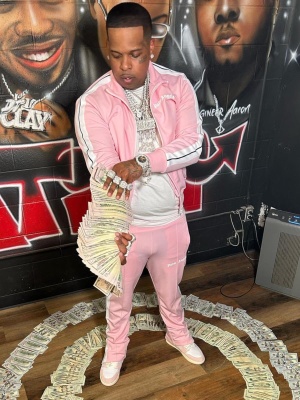 Finesse2tymes Wearing A Palm Angels Pink Track Jacket And Trackpants With Jordan 1 Sneakers
