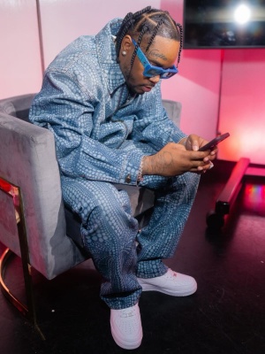 Fivio Foreigh Wearing A Louis Vuitton X Yk Blue Sunglasses Denim Jacket And Jeans Outfit