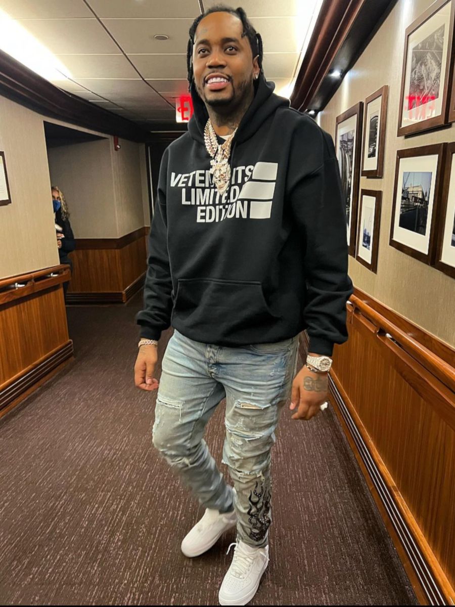 Fivio Foreign Watches The Knicks In a Vetements Hoodie & Amiri Flame Jeans