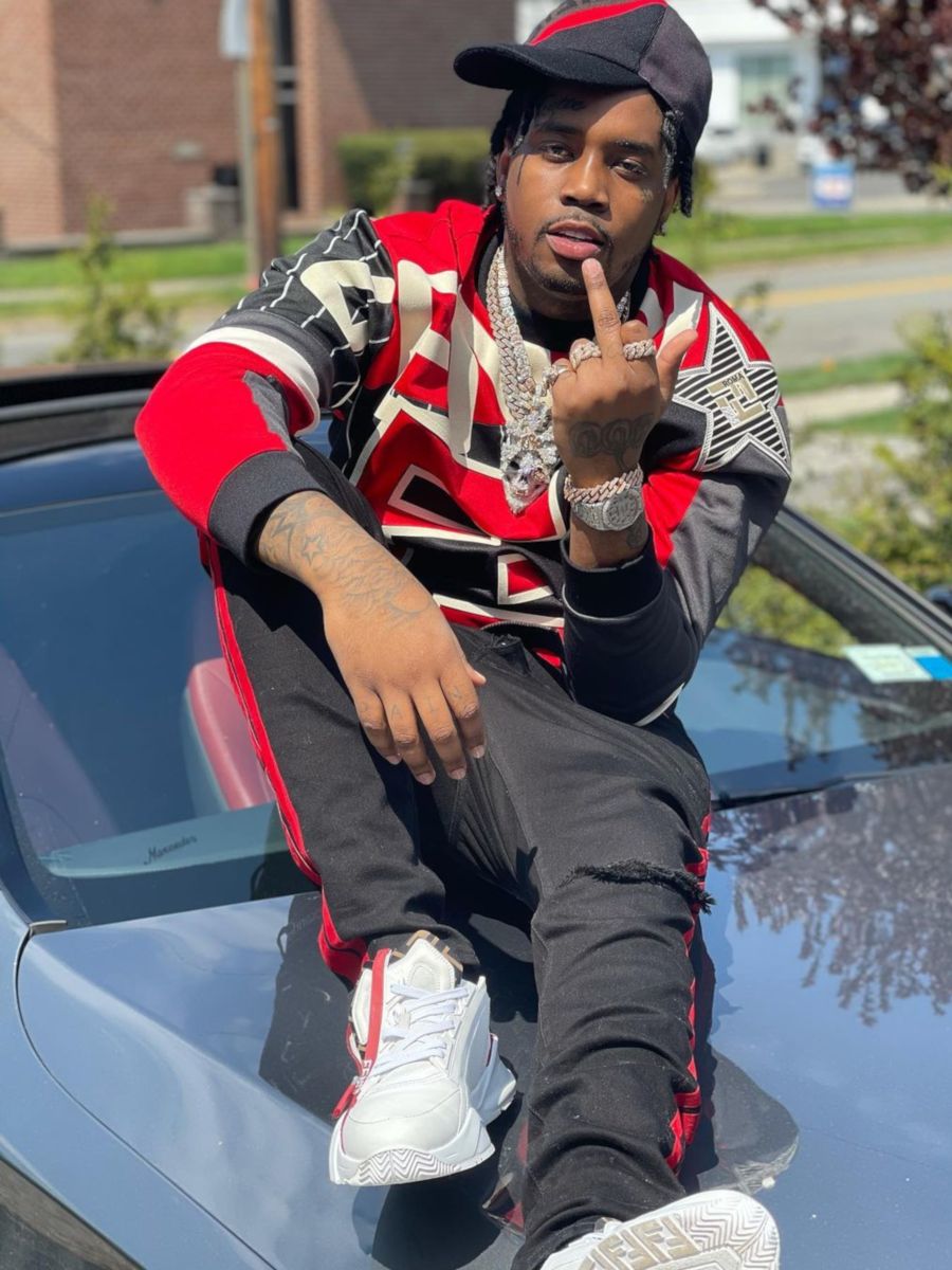 Fivio Foreign Wearing a Black and Red Fendi, & Amiri Outfit