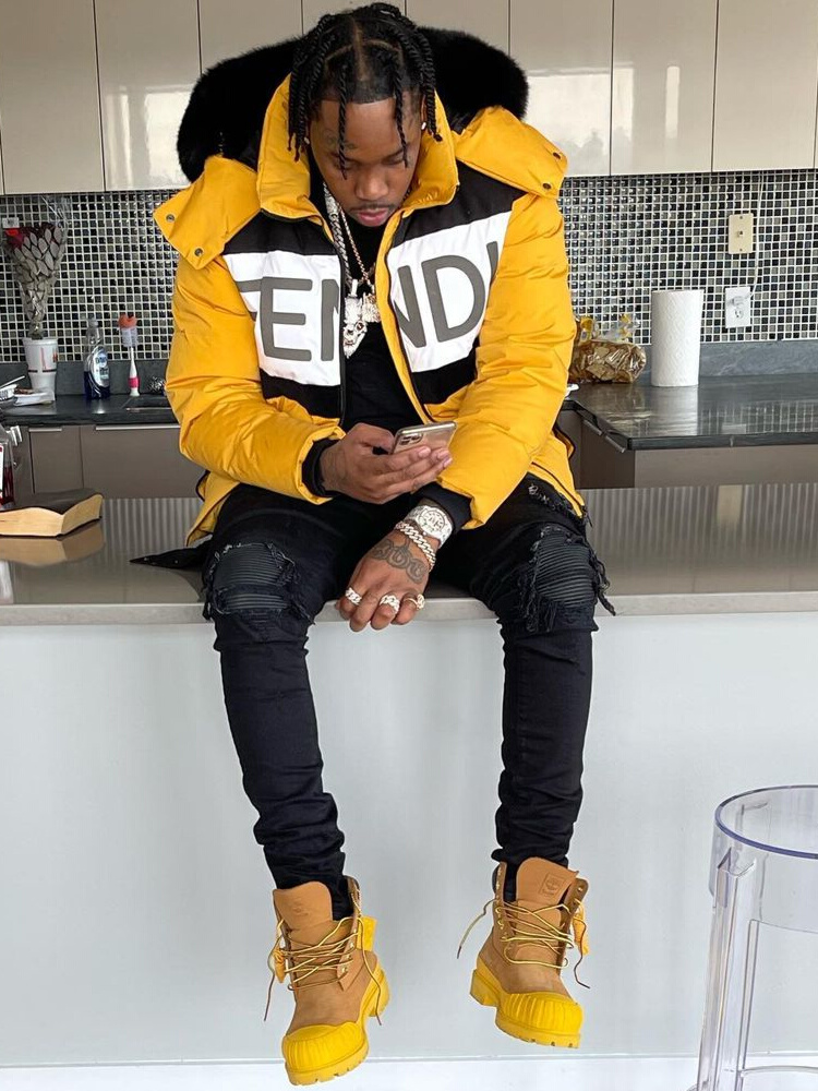 Fivio Foreign Wearing a Fendi Puffer With Amiri Jeans & Timberland Boots