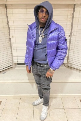 Fivio Foreign Wearing A Purple Dior Obique Pufer And Cd Hoodie With An Oblique Belt And Sneakers With Amiri Jeans