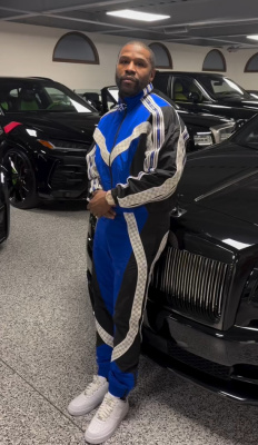 Floyd Mayweather Wearing A Louis Vuitton Tracksuit And Nike Af1s