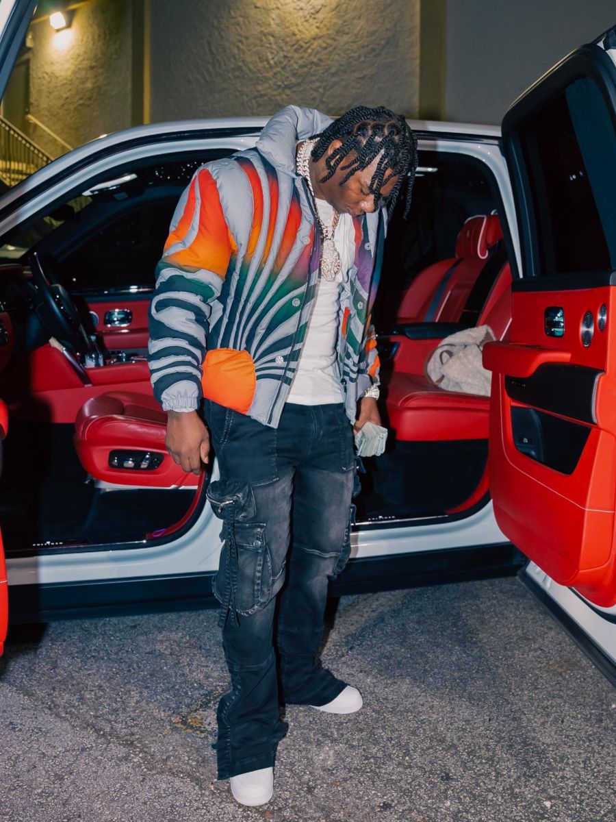 Fredo Bang Wearing a Sunset Patterned Down Jacket With Amiri Jeans & Nike AF1s