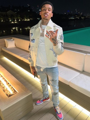 Fredo Wearing A Lv Varsity Jacket With A White Belt Rolex Watch Amiri Jeans And Patent Af1s