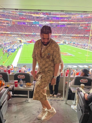 French Montana At Superbowl 56 Wearing A Gucci Pineapple Shirt And Shorts