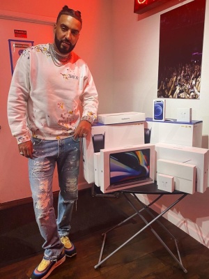 French Montana Wearing A Dior Paint Splatter Jacket And Nike Air Max Sneakers