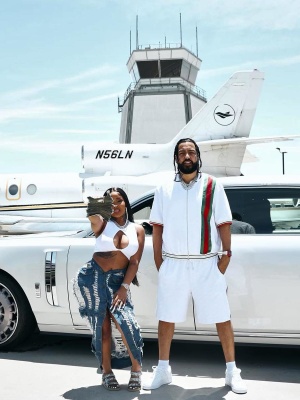 French Montana Wearing A Gucci White Striped Zip Shorts And Shorts