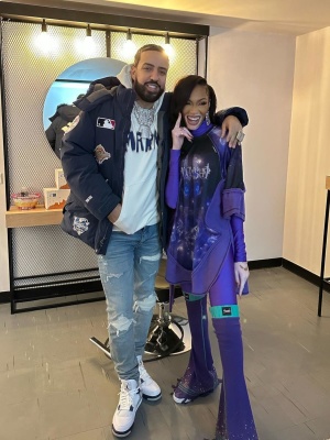 French Montana Wearing A Supreme Yankees Down Parka With A Marni Hoodie Amiri Jeans And Jordan Sneakers