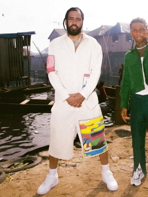 French Montana Wearing The Elder Statesman White Cartoon Patch Shirt And Shorts With Nike Af1s