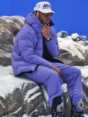 Future Wearing Louis Vuitton Sunglasses With A Dior Purple Puffer And Ski Pants And Oblique Snow Boots