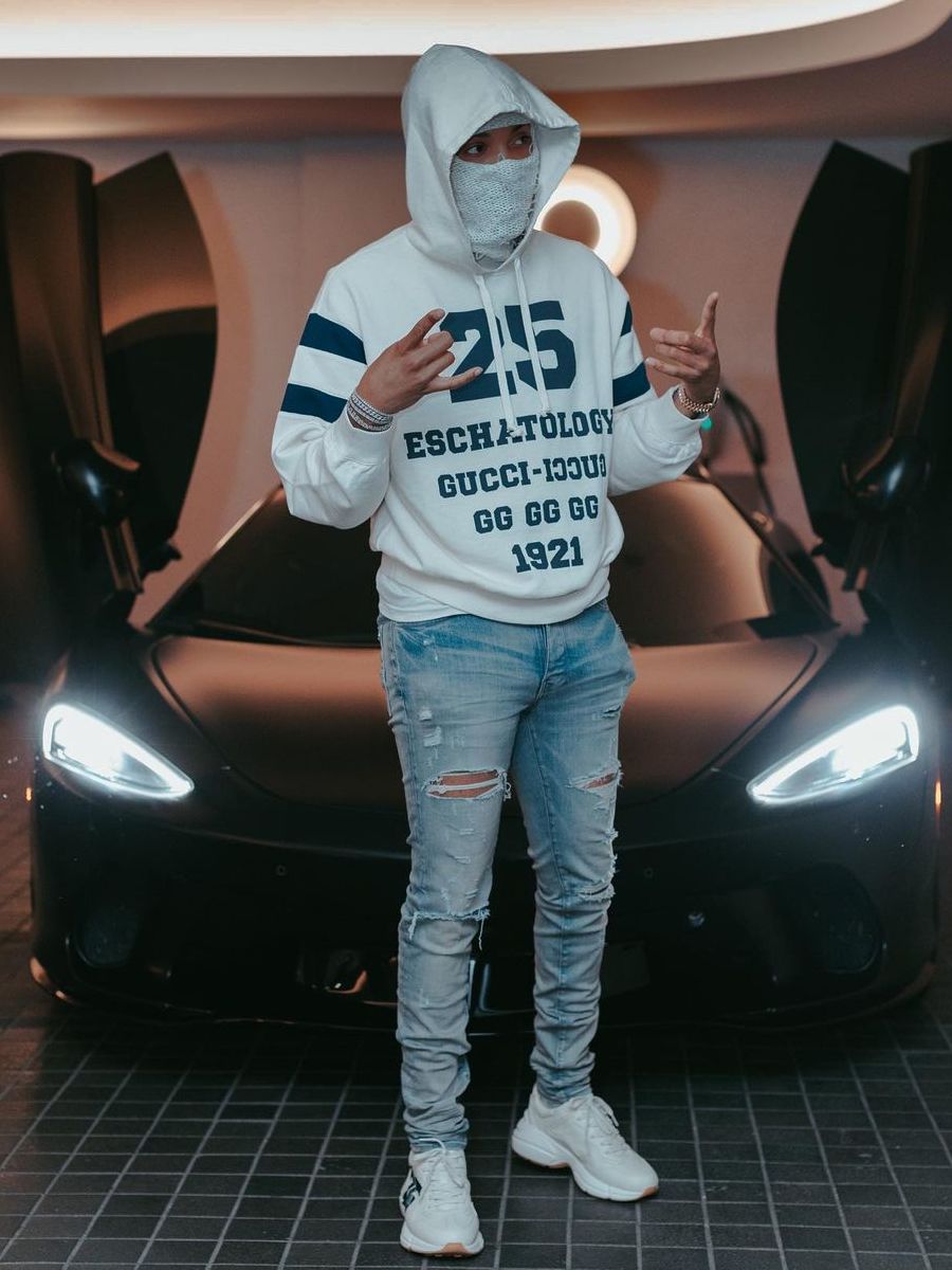 G Herbo Wearing a White and Navy Gucci '25' Outfit
