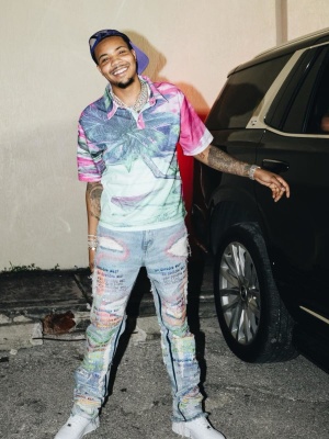 G Herbo Wearing A Who Decides War Tropical Polo And Roygbiv Fusion Jeans