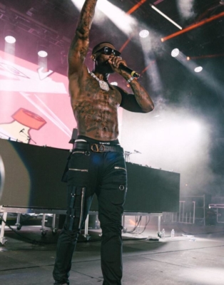 Gucci Mane Performs At Rolling Loud Music Festival In Black Undercover Pants And Valentino Belt And Shoes