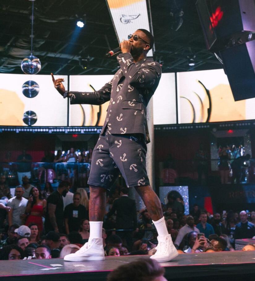 Gucci Mane Performs in Thom Browne Anchor Pattern Navy Blazer & Shorts