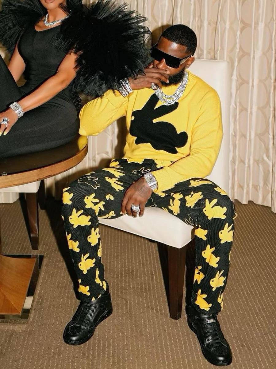 Gucci Mane: Black Shield Sunglasses, Yellow Bunny Sweater & Bunny Patch Pants