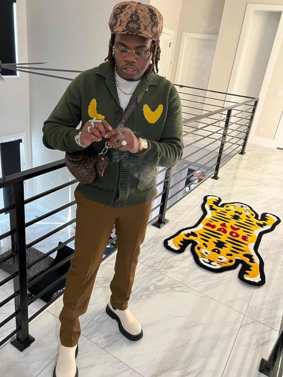 Gunna Wearing a Louis Vuitton x Nigo Sweater & Duck Bag With Bottega Boots  | Incorporated Style