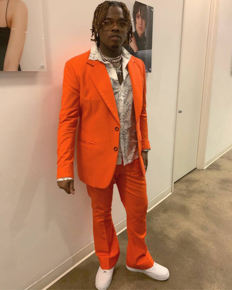 Gunna Wearing an Orange Suit and Valentino Shirt In NYC