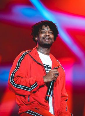 Instagram Post Of 21 Savage At The Dreamville Fest Wearing Red Amiri Three Star Track Jacket And Track Pants