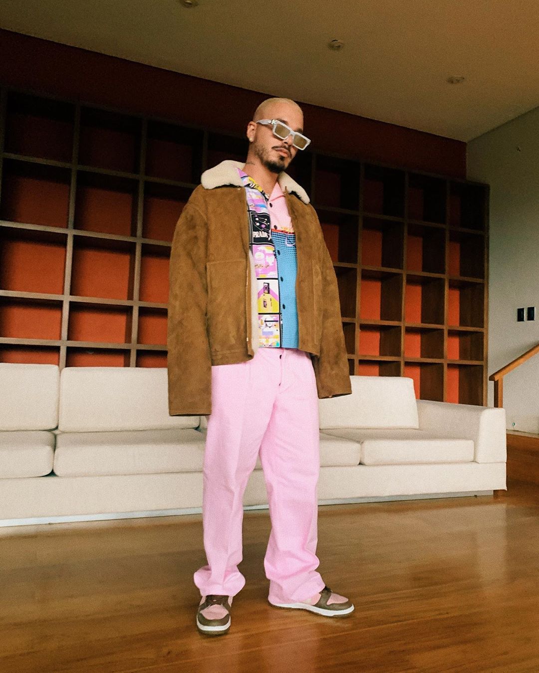 J Balvin Shows Off His Pink & Brown Louis Vuitton, Nike, & Prada 'Fit