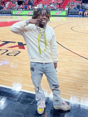 Jackboy Watching The Miami Heat In A Lanvin Hoodie And Sneakes With Amiri X Rhee Studio Carpenter Jeans