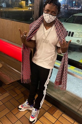 Jackboy Wearing A Dior Polo And Scarf With Amiri Stripe Jeans And Dior B22s