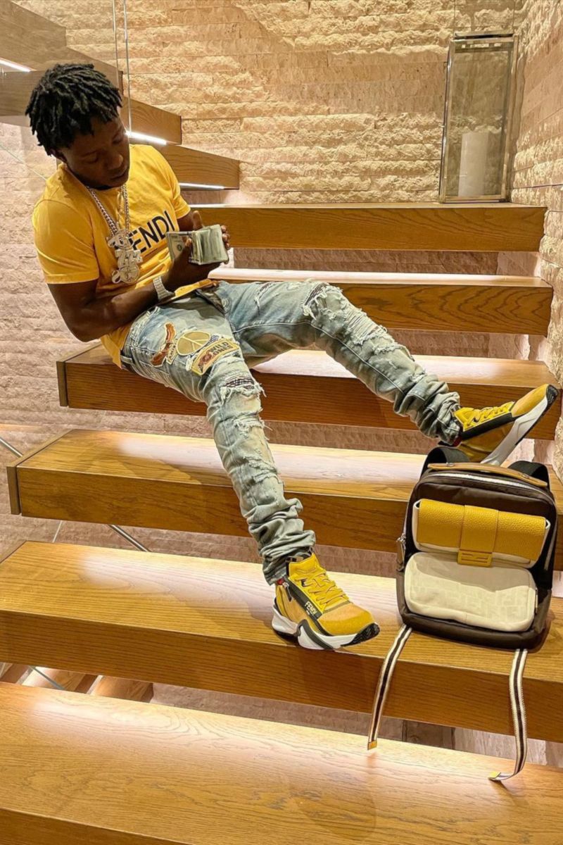 Jackboy Wearing a Fendi Yellow Tee & Sneakers With Amiri Patch Jeans