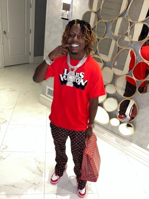 Jackboy Wearing A Louis Vuitton Tee With And Trackpants With Louis Vuitton X Nike Dunks And A Goyard Bag