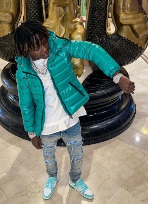 Jackboy Wearing A Moncler Bady Jacket With A Dior Tee Amiri Pajama Patch Jeans And Louis Vuitton Trainer Sneakers