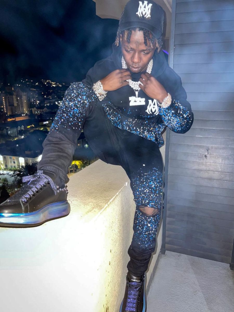 Jackboy Wearing an Amiri 'Crystal Painter' Collection Outfit With McQUEEN Sneakers