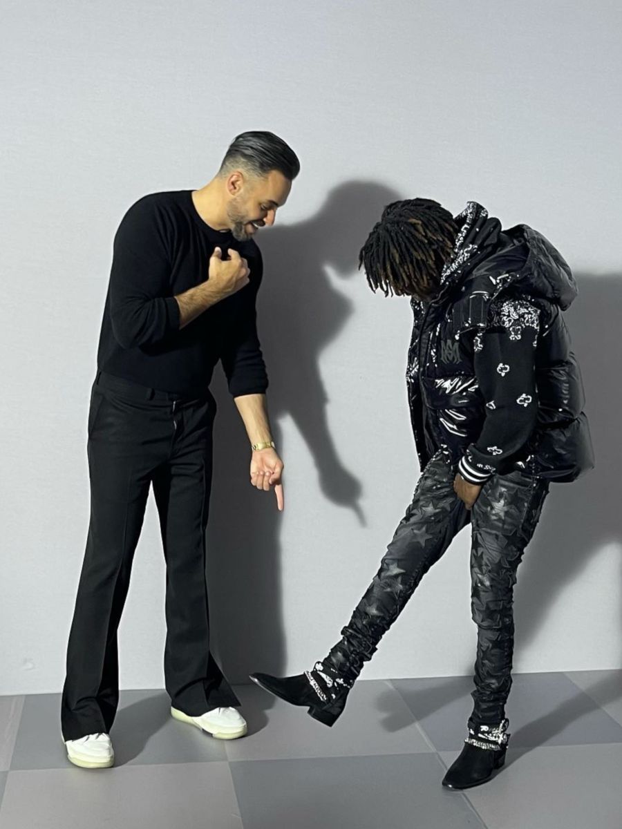 Jackboy At The Amiri FW22 Show In an All Black Amiri Outfit & Boots