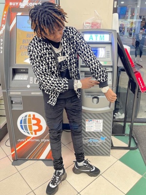 Jackboy Wearing An Amiri X Playboy Bomber Jacket With A Lv Tee Amiri Velvet Jeans And Dior B22 Sneakers