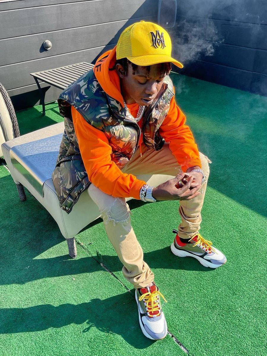 Jackboy Wearing a Celine Camo Vest & Hoodie With Matching Dior Sneakers
