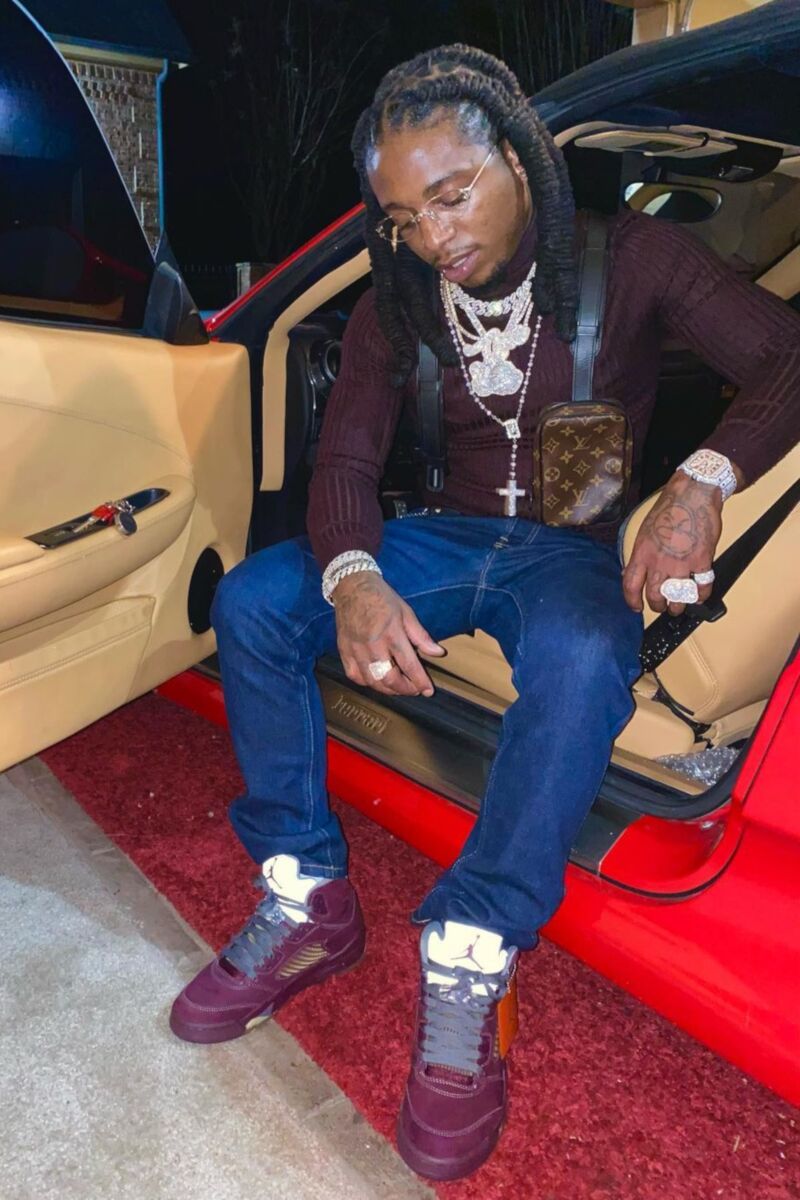 Jacquees Wearing a Louis Vuitton Harness Bag With Jordan 5 Sneakers