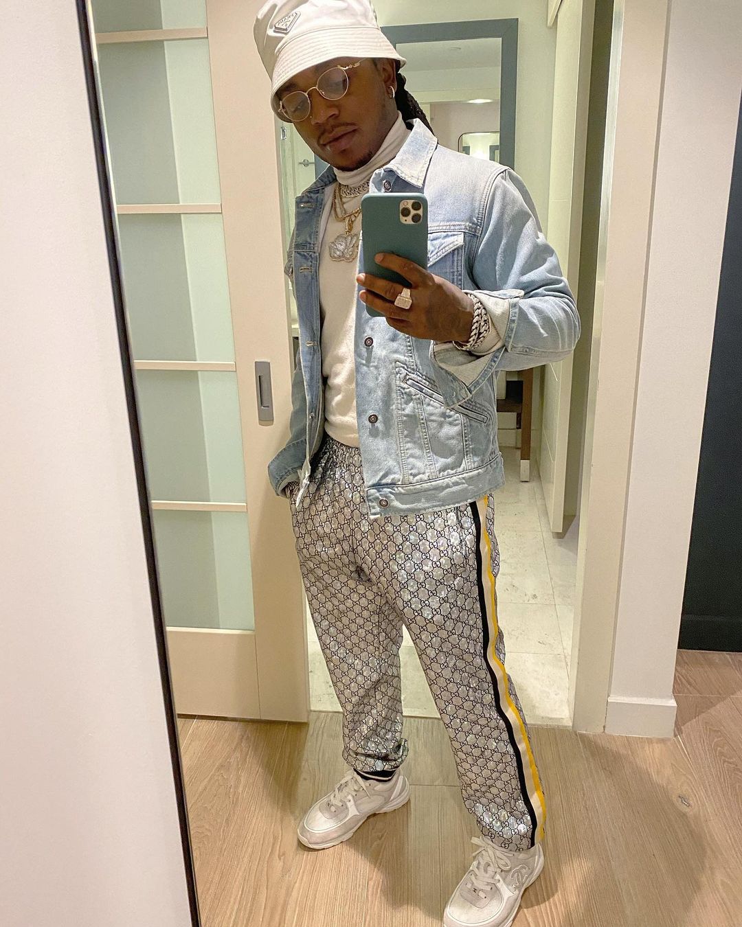 Jacquees Wearing a Prada, Givenchy, Gucci & Chanel Outfit
