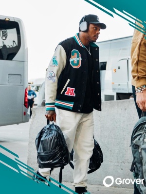 Jalen Ramsey Wearing An Ovo X Miami Dolphins Varsity Jacket Ysl Logo Backpack And Nike X Tiffany Sneakers