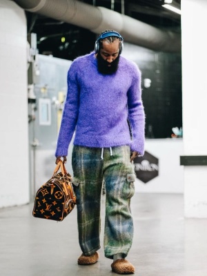 James Harden Wearing A Marni Purple Sweater And Brown Shearling Mules With Tartan Cargo Pants And A Louis Vuitton Cargo Pocket Duffle Bag
