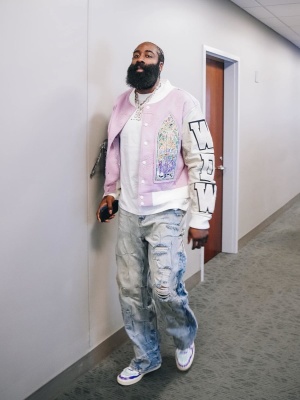 James Harden Wearing A Who Decides War Pink Varisty Jacket And Blue Jeans With A Marni Tee And Marni Sneakers
