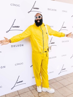 James Harden Wearing Louis Vuitton Millionaires Sunglasses With Yellow Prada Jacket And Pants And Bottega Veneta Boots