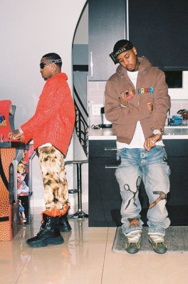 Jeremih Wearing Moncler Goggles Amiri Cargo Pants Jeans And Over Shirt And Lanvin Sneakers