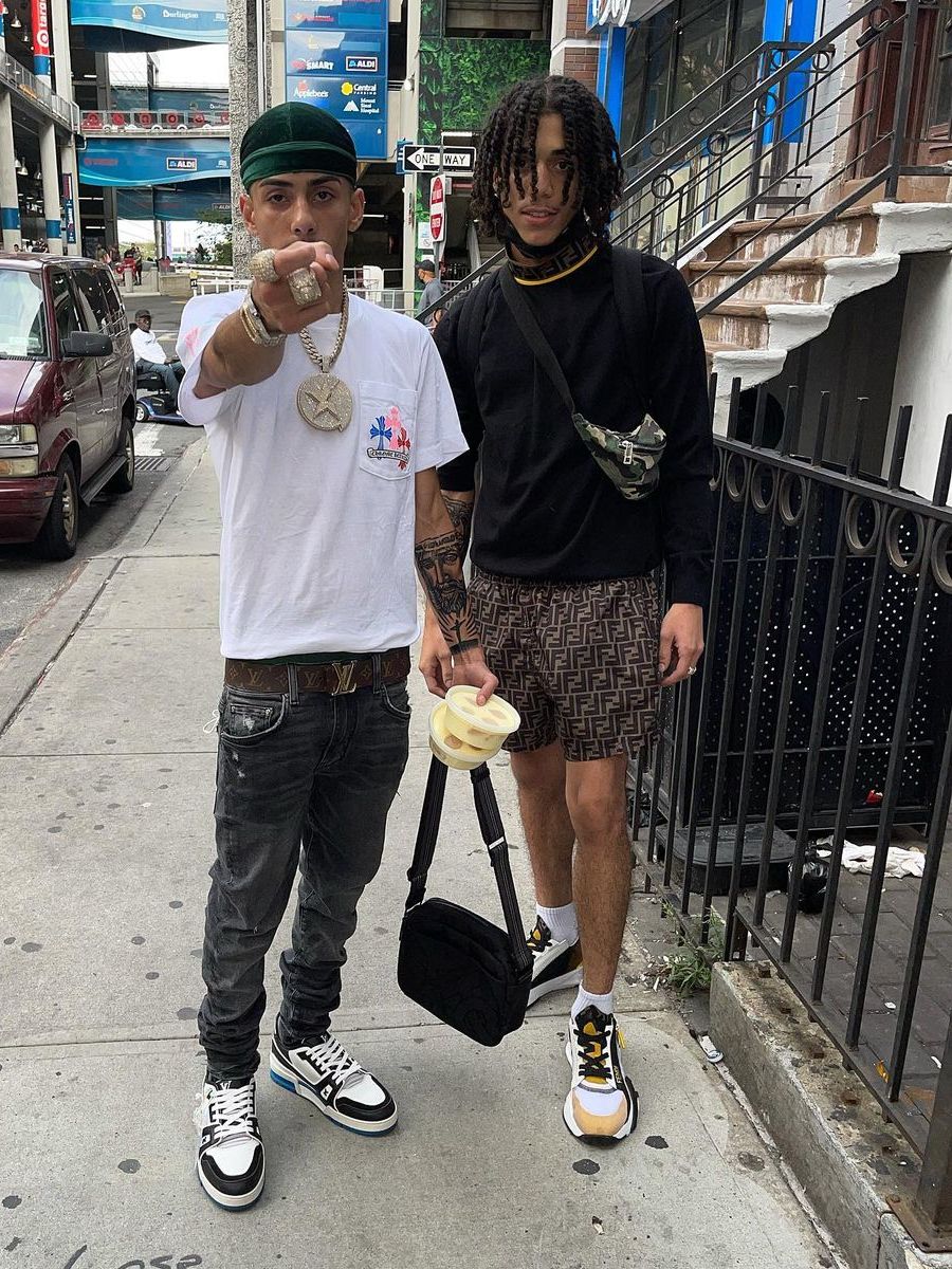 J.I. Wearing a Chrome Hearts Tee With a Burberry Bag & LV Sneakers
