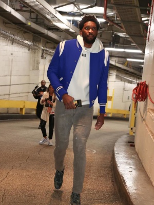 Joel Embiid Wearing A Saint Laurent Blue Teddy Jacket Dolce Hoodie And Louboutin Camo Sneakers