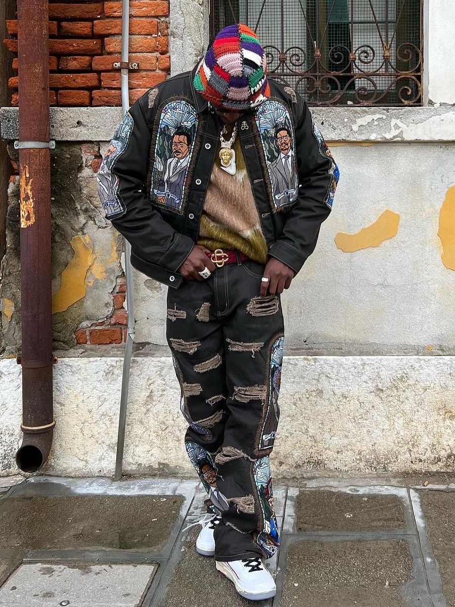 Joey Badass Wearing Off-White Sunglasses With a Stained Glass Jacket & Jeans