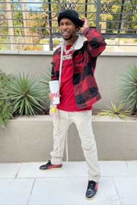 Key Glock Wearing A Balenciaga Red T Shirt With Fear Of God Trackpants And Jordan Black Red Sneakers