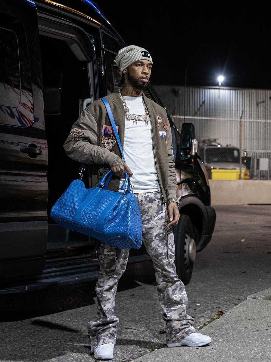 Key Glock: Chanel Beanie, Dior Jacket, Camo Cargo Pants & Jordan x OVO 8s